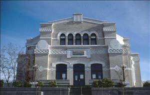 A large white stone building with elaborate masonry details